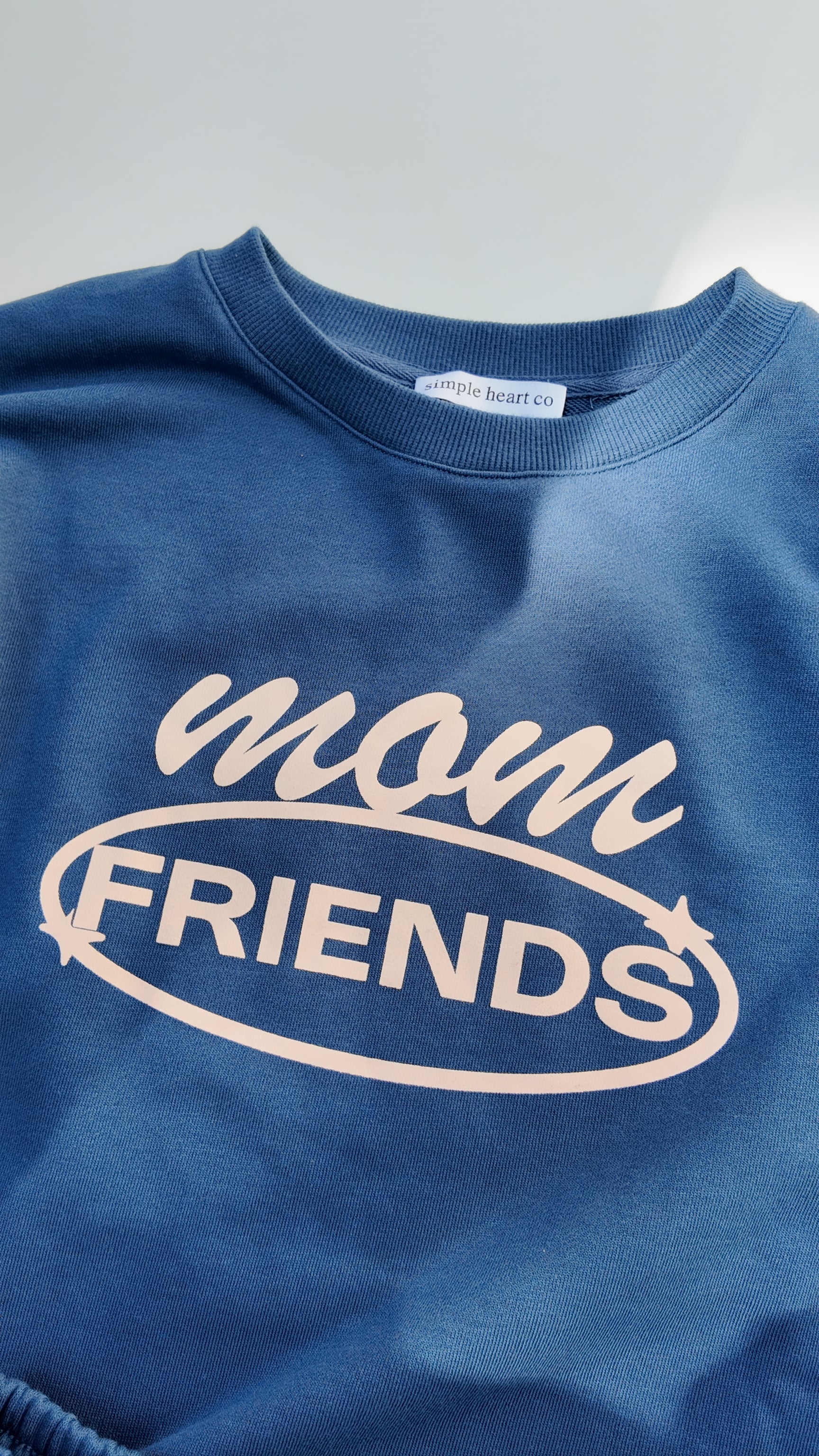 Blue Mom Friends sweatshirt with motivational motherhood quote and sleeve icons, cozy cotton blend crewneck